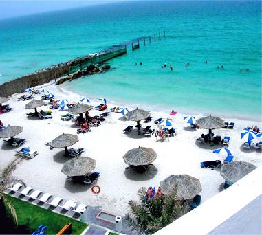 Escolha um destino de férias: hotéis em Sharjah com praia particular